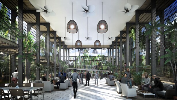A spacious indoor area with high ceilings, modern seating arrangements, and large windows allowing natural light. - Royal Green (Moka)