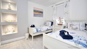 2 slaapkamers, een strijkplank/strijkijzer, reisbedje, gratis wifi