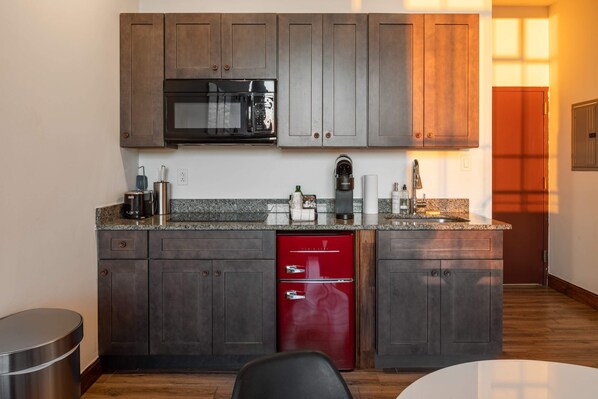 Fridge, microwave, stovetop, coffee/tea maker