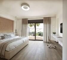 Ropa de cama hipoalergénica y caja de seguridad en la habitación 