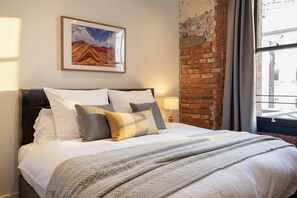 1 slaapkamer, een strijkplank/strijkijzer, wifi, beddengoed