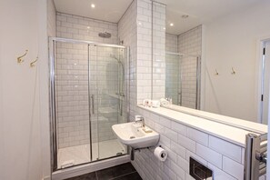 Shower, free toiletries, hair dryer, towels