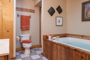 Shower, jetted bath, towels, soap