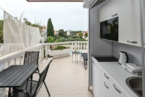 Chambre Confort, plusieurs lits, terrasse | Terrasse/Patio