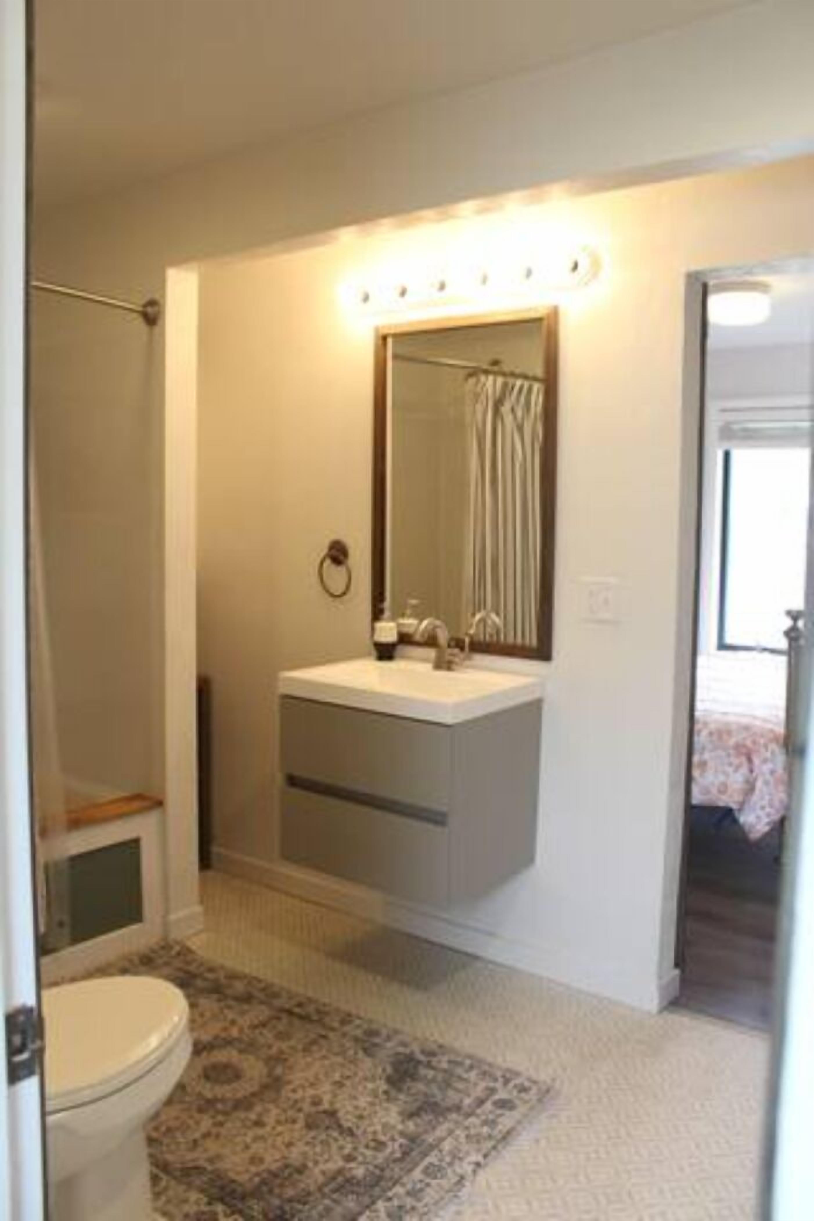 Combined shower/tub