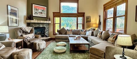 Fireplace, video games, DVD player, foosball