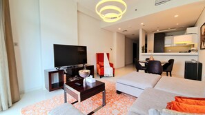 Apartment | Living area | 32-inch flat-screen TV with cable channels, TV - Marco Polo - Serene 1 BR APT amidst Golf Course with Gym & Pool (Dubai)