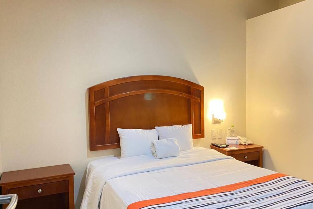 Kamar Single Basic, 1 kamar tidur, patio | Meja kerja, ruang kerja ramah laptop, dan setrika/meja setrika