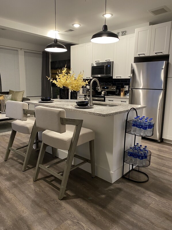 Microwave, coffee/tea maker, cookware/dishes/utensils