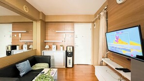 Living area - Compact and Comfy 2BR Bassura City Apartment (Jakarta)