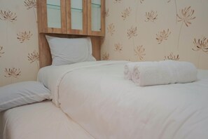 Room | 3 bedrooms, free WiFi, bed sheets - Best Furnished 2BR Mall Access at Green Pramuka Apartment (Jakarta)