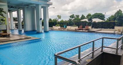 Homey and Cozy Living Studio at Pakubuwono Terrace Apartment