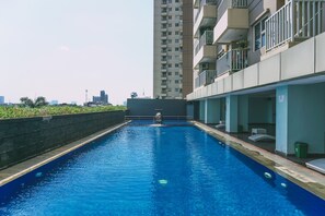 Outdoor pool - Wonderful 2BR Apartment at Belmont Residence Puri (Jakarta)