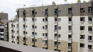 A multi-story residential building with balconies and a uniform architectural style. - Minimalist Studio Gateway Ahmad Yani (Bandung)