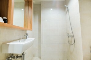 Room | Bathroom | Shower, free toiletries, towels - Furnished Studio (No Kitchen) Apartment Mustika Golf Residence (Cikarang)
