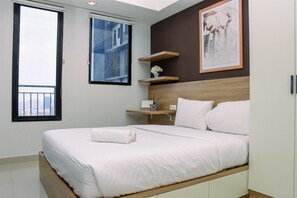 1 bedroom, free WiFi, bed sheets - Comfy Studio Room at Evenciio Margonda Apartment (Depok)