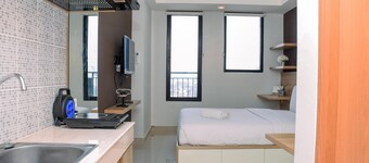 Comfy Studio Room at Evenciio Margonda Apartment