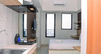 Comfy Studio Room at Evenciio Margonda Apartment