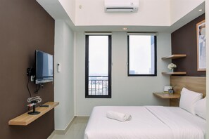 1 bedroom, free WiFi, bed sheets - Comfy Studio Room at Evenciio Margonda Apartment (Depok)