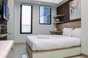 1 bedroom, free WiFi, bed sheets - Comfy Studio Room at Evenciio Margonda Apartment (Depok)
