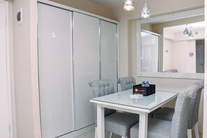 Fridge, stovetop, cookware/dishes/utensils - Comfortable Combined Unit 3BR at Bassura City Apartment near Mall (Jakarta)