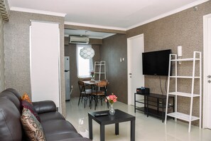 TV - Spacious and Comfortable 2BR at Bassura City Apartment near Mall (Jakarta)
