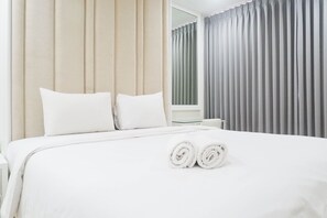 Room | 1 bedroom, bed sheets - Spacious 1BR Apartment at Praxis (Surabaya)