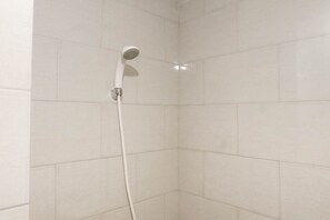 Shower, free toiletries, towels - Best Value 1BR Apartment Connected to Mall at Anderson Supermall Mansion (Surabaya)