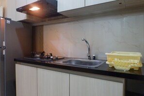 Fridge, stovetop, cookware/dishes/utensils