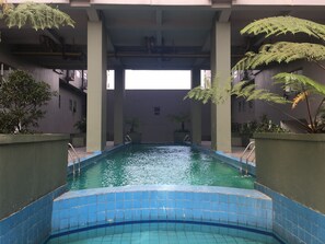 Outdoor pool - Modern and Comfy Studio Room at Grand Asia Afrika Apartment (Bandung)