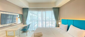 Modern and Spacious Studio Room at Green Kosambi Apartment