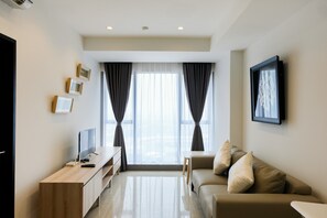 Living area - Elegant Best View 1BR Branz Apartment (Pagedangan)