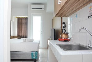 Fridge, stovetop, cookware/dishes/utensils - Best Deal The Springlake Summarecon Studio Apartment (Bekasi)