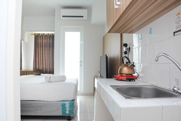 Fridge, stovetop, cookware/dishes/utensils - Best Deal The Springlake Summarecon Studio Apartment (Bekasi)