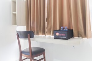 TV - Cozy Studio at Elvis Tower Apartment (Cikarang)