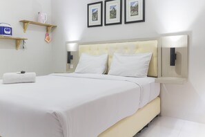 Room | 1 bedroom, bed sheets - Cozy Studio at Elvis Tower Apartment (Cikarang)