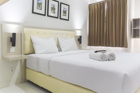 Room | 1 bedroom, bed sheets. Cozy Studio at Elvis Tower Apartment