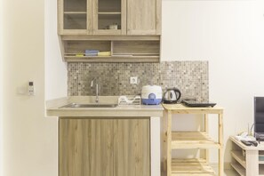 Room | Private kitchen | Fridge, stovetop, cookware/dishes/utensils - Homey and Cozy Stay 2BR at Meikarta Apartment (Cikarang)