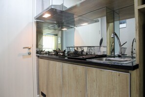 Private kitchen - Homey Studio Apartment @ Springlake View Summarecon Bekasi (Bekasi)