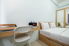 TV - Comfy and Nice Studio Apartment at Tamansari Mahogany (Karawang)