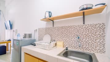 Fridge, stovetop, cookware/dishes/utensils