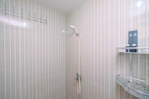 Room | Bathroom | Shower, free toiletries, towels - Comfortable and Tidy Studio at Cinere Resort Apartment (Depok)