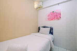 Room | 2 bedrooms, free WiFi, bed sheets - Homey and Compact 2BR Cibubur Village Apartment (Depok)