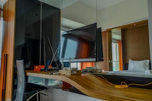 TV - Compact and Modern Studio Room at Casa De Parco Apartment (Pagedangan)