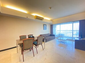 TV - Prime & Cozy 3BR at Braga City Walk Apartment (Bandung)