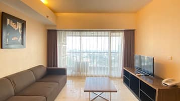 Quarto | Área de estar | TV