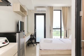 Room | 1 bedroom, free WiFi, bed sheets - Comfortable Studio at Monroe Tower Apartment (Cikarang)