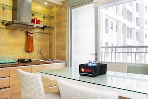 Fridge, stovetop, cookware/dishes/utensils - Comfy and Spacious 2BR at Seasons City Apartment (Jakarta)