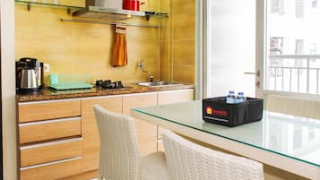 Fridge, stovetop, cookware/dishes/utensils