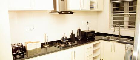 Fridge, microwave, oven, stovetop